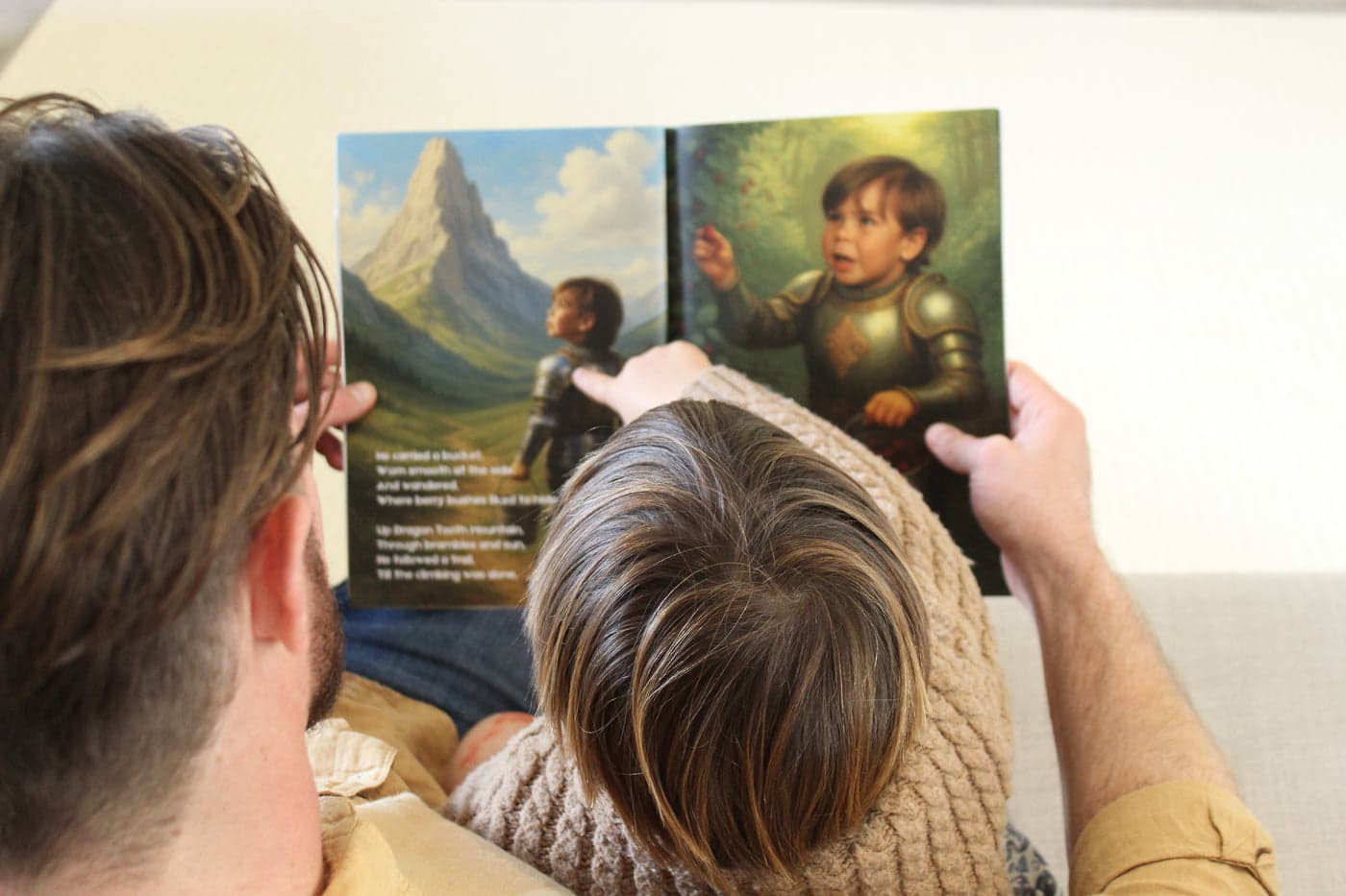 A child holding their personalised dragon book